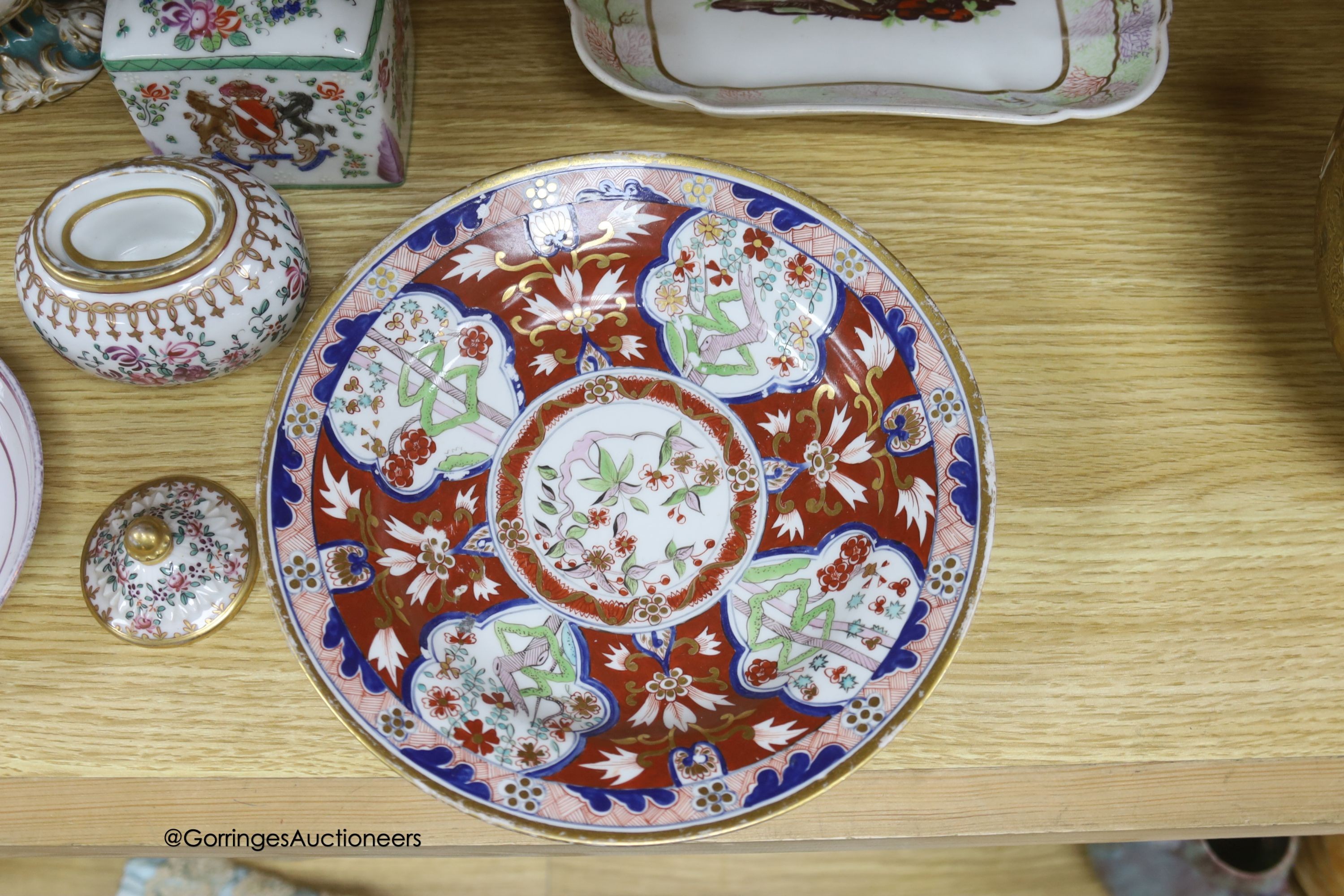 A pair of Rockingham style floral encrusted lidded vases, an armorial jar, two 19th-century English porcelain dishes etc